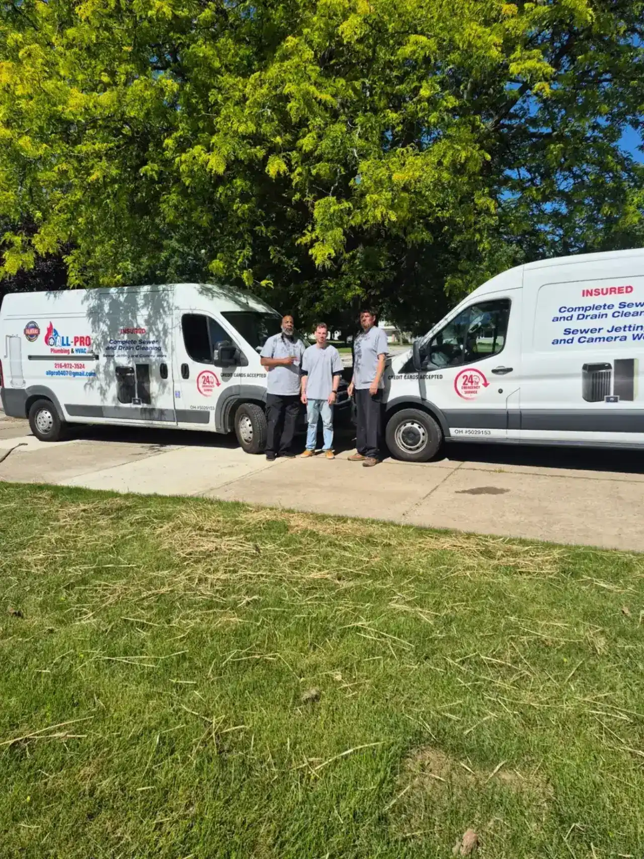 All-Pro Plumbing & HVAC crew with their sewer and drain cleaning vans in Brunswick, OH
